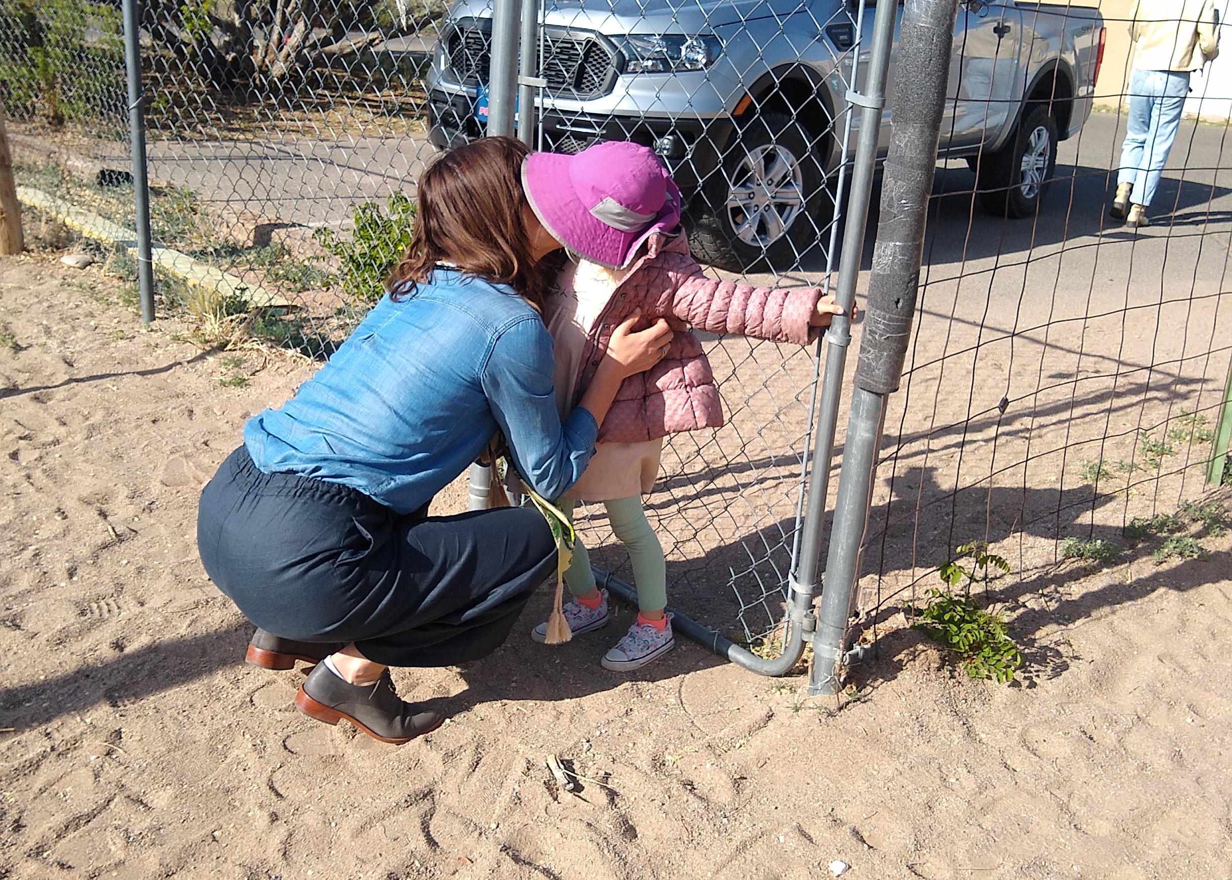 child saying goodbye - crop