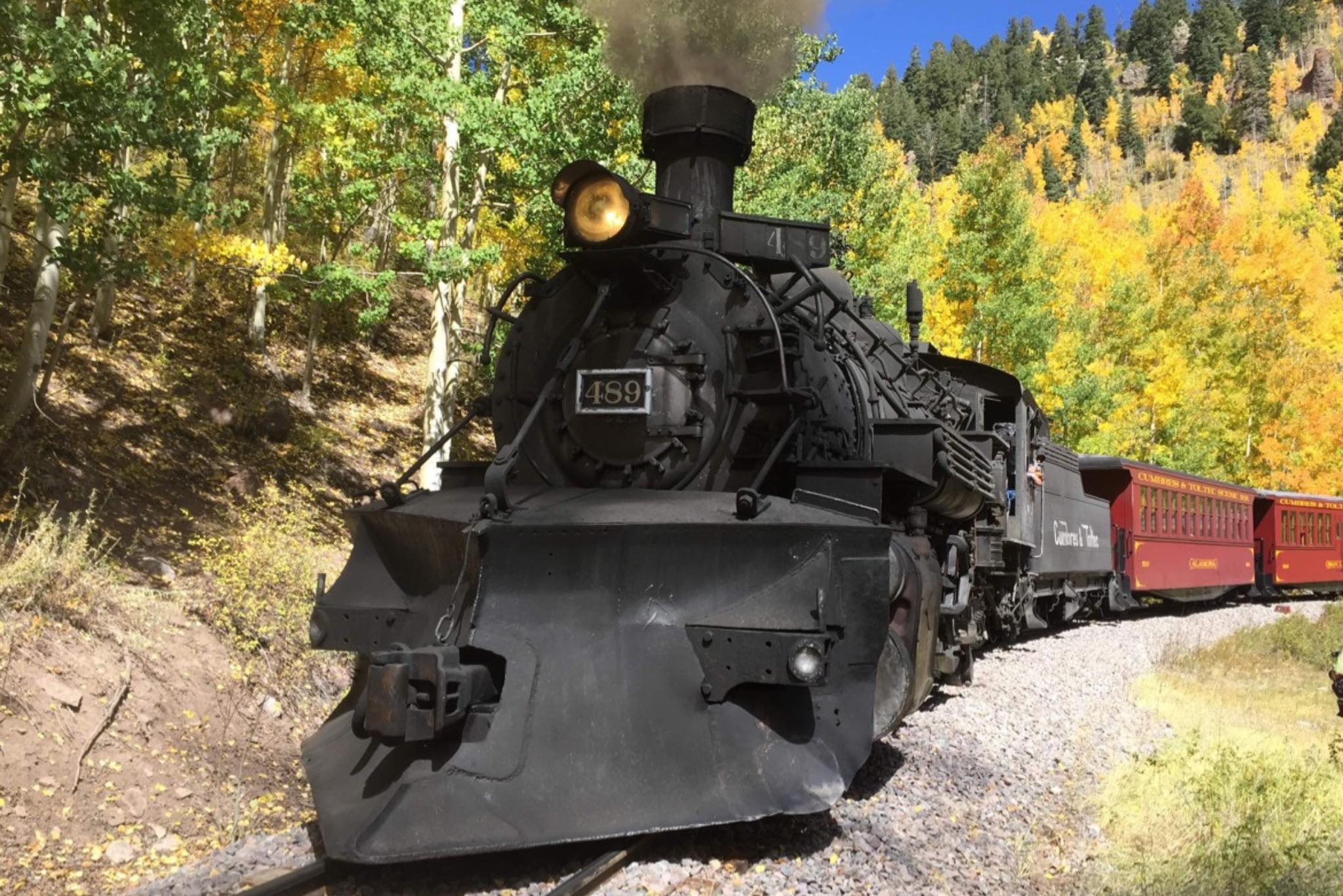 antique passenger train and fall colors