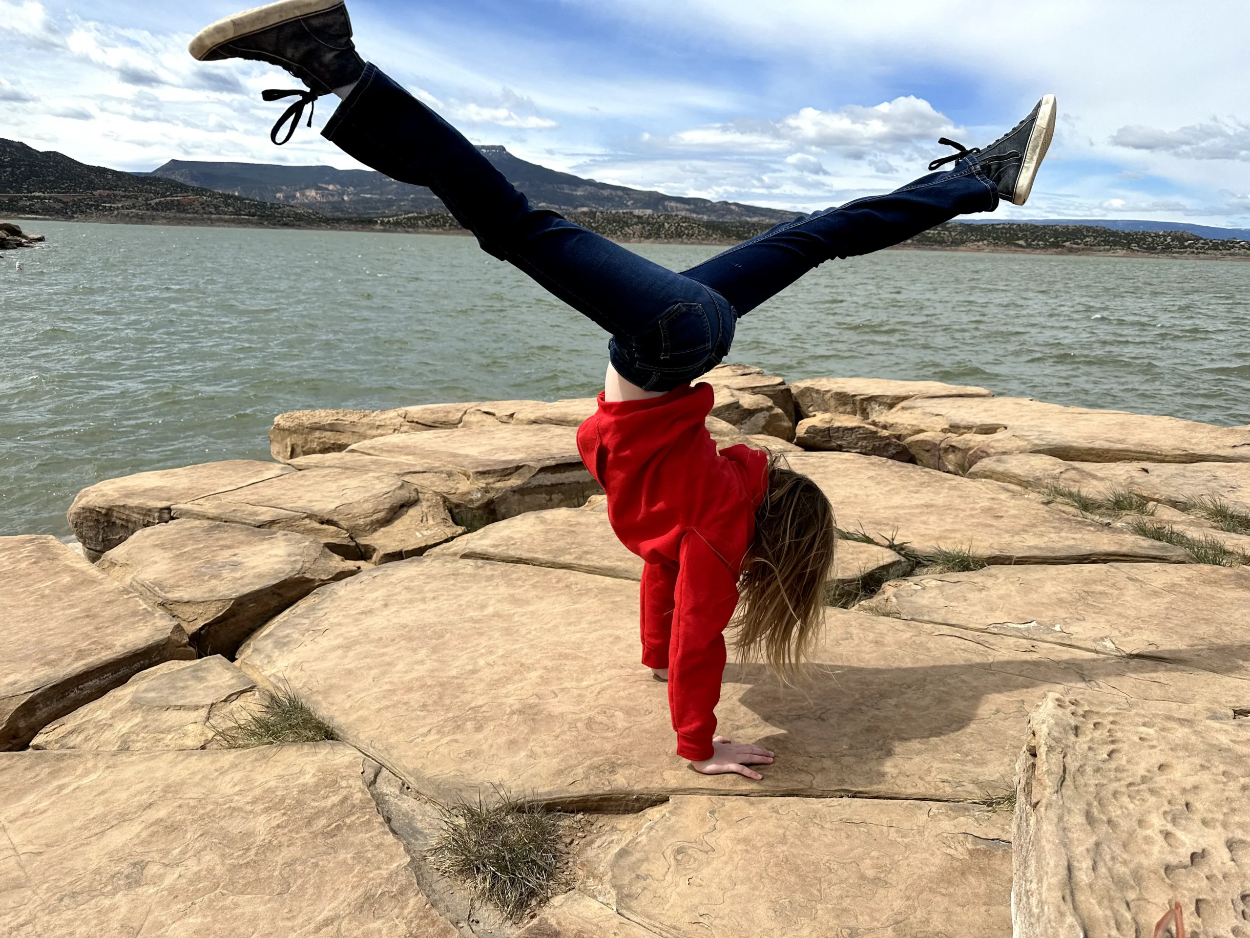 Daphne Fleming playing on the soft sandstore rocks at
Abiquiu Reservoir.