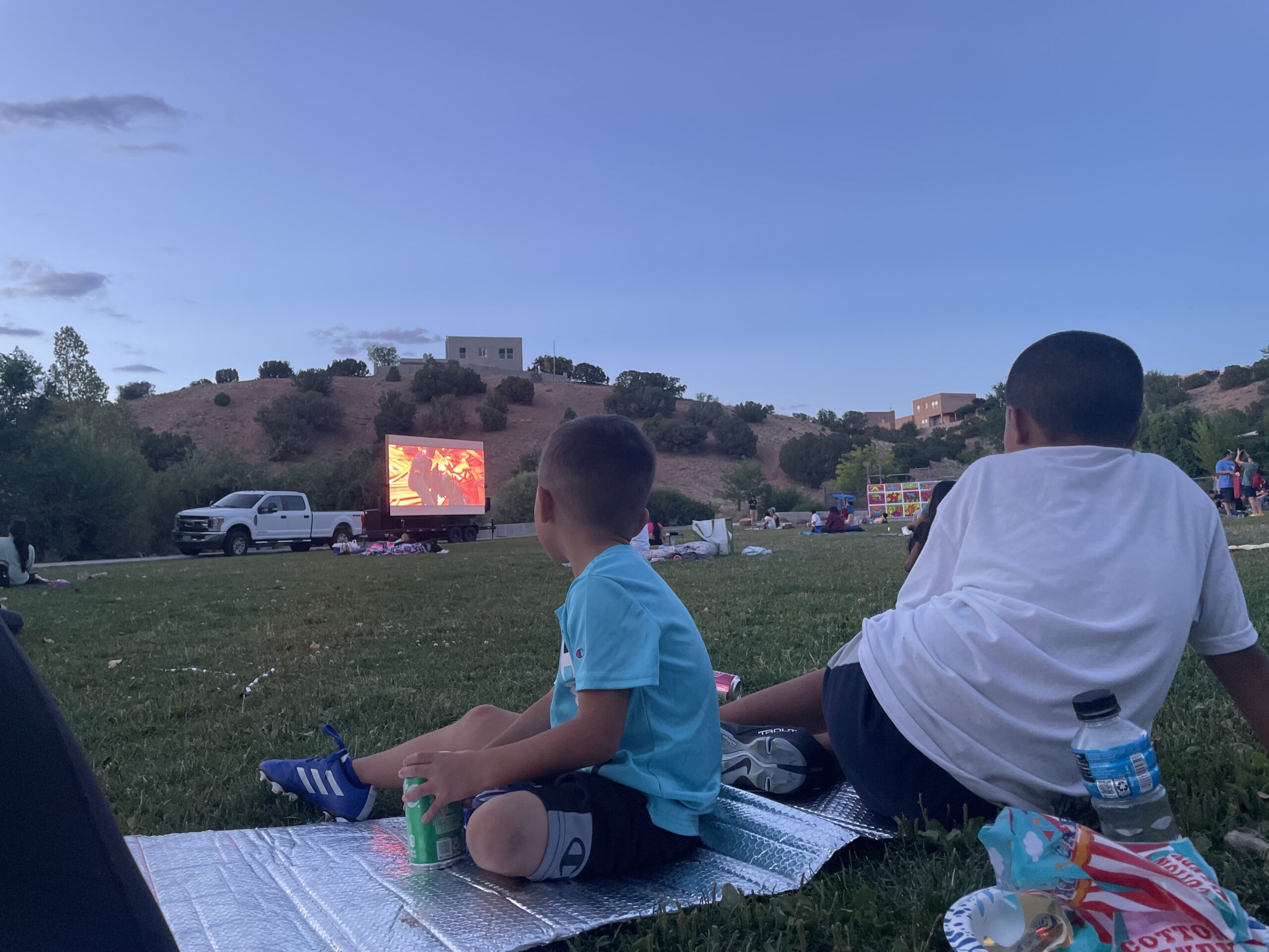 Watching a movie at sunset with Brother (Santa Fe Public Schools).