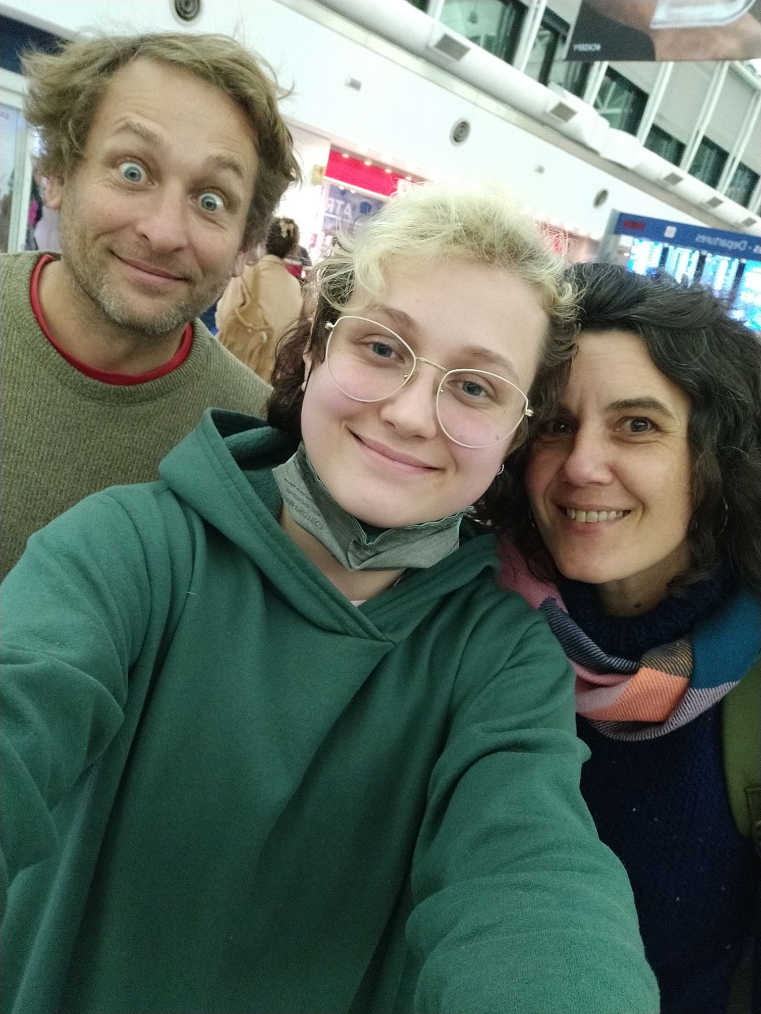 My parents and me at the airport the day I left.