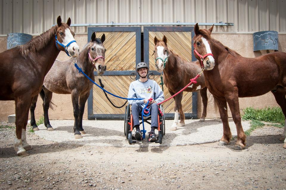 Thomas Maestas with NMCTR’s horses.