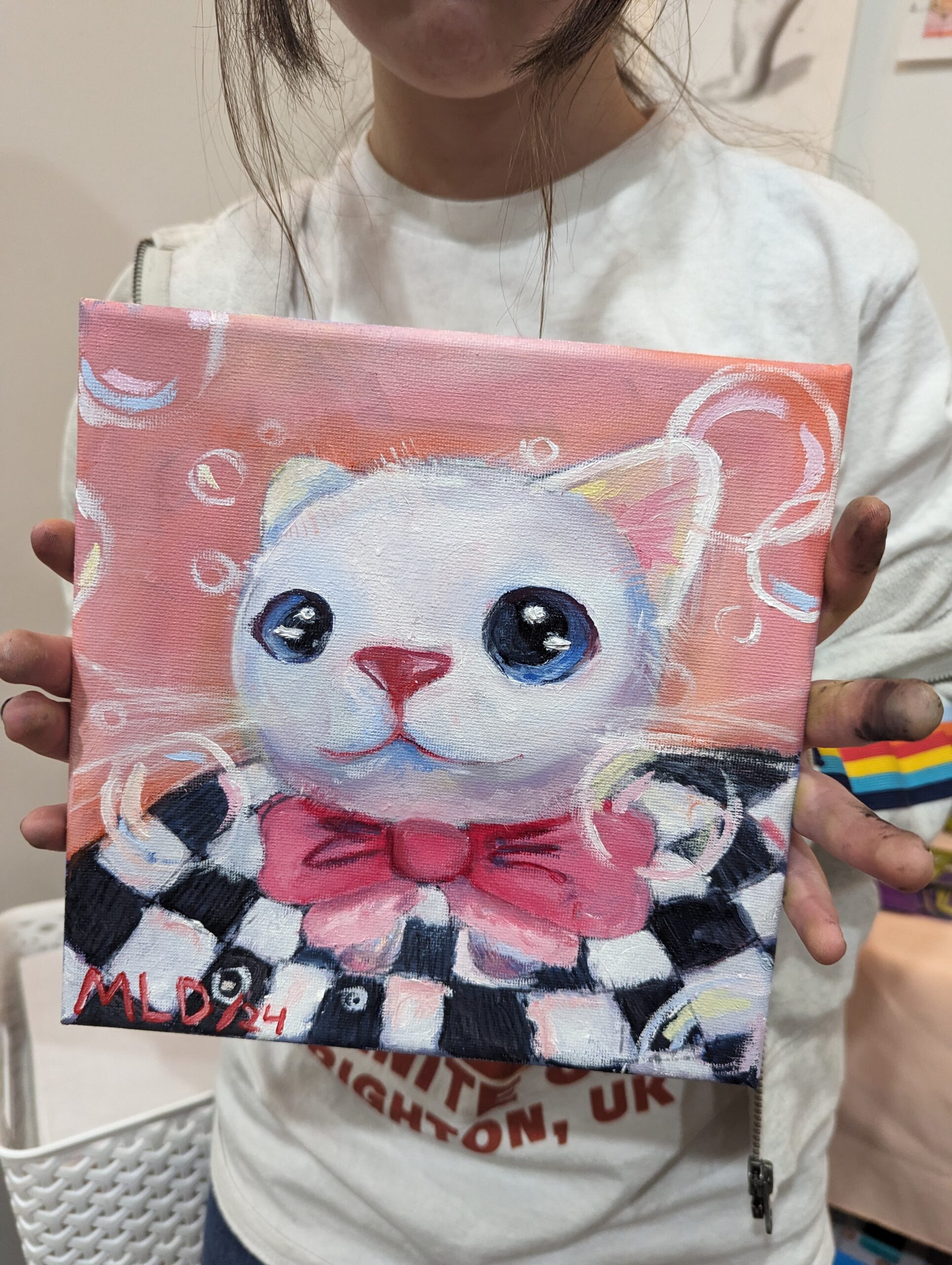artwork of cat with pink and checkered pattern