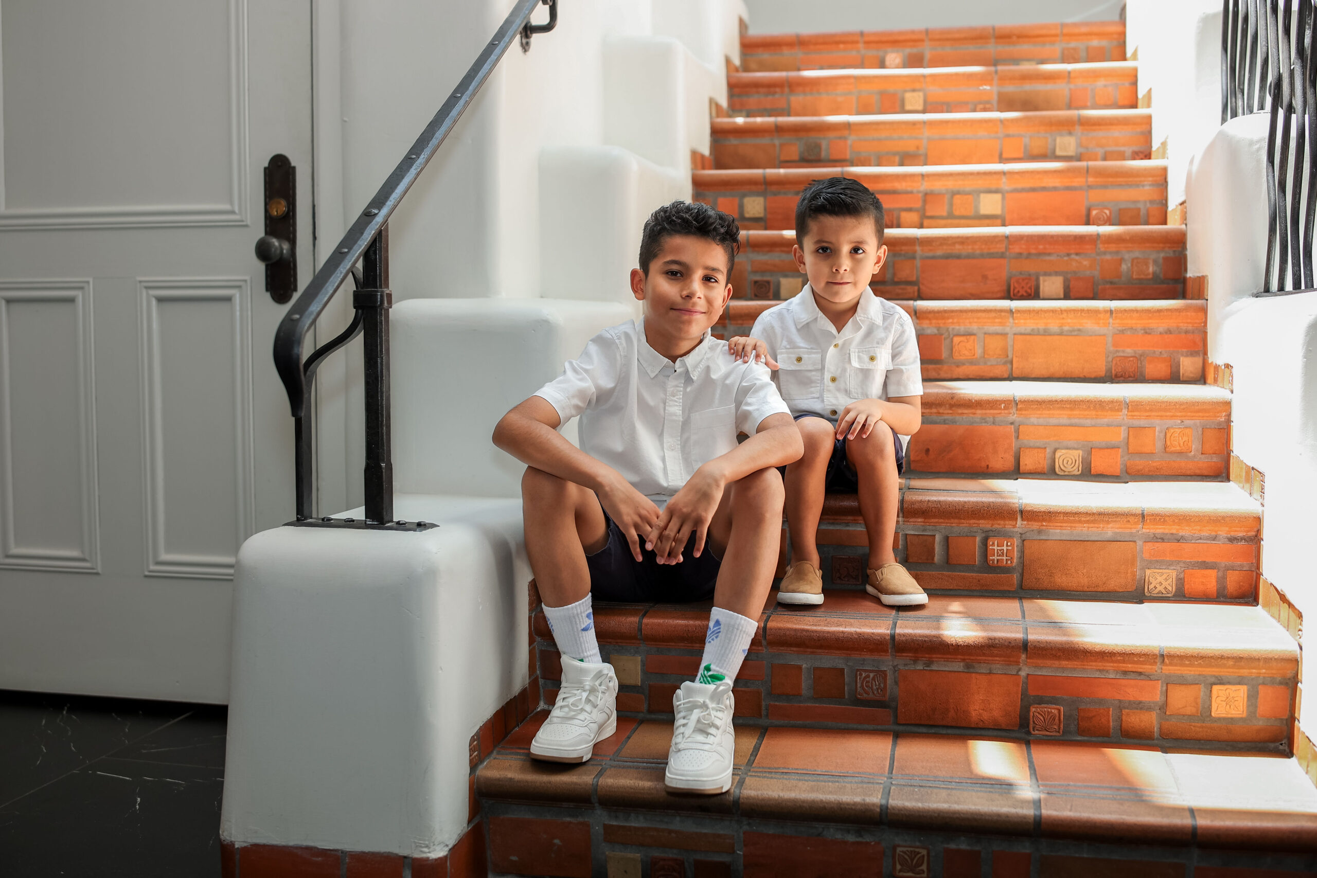 Armando and Marisol two boys on the stairs
