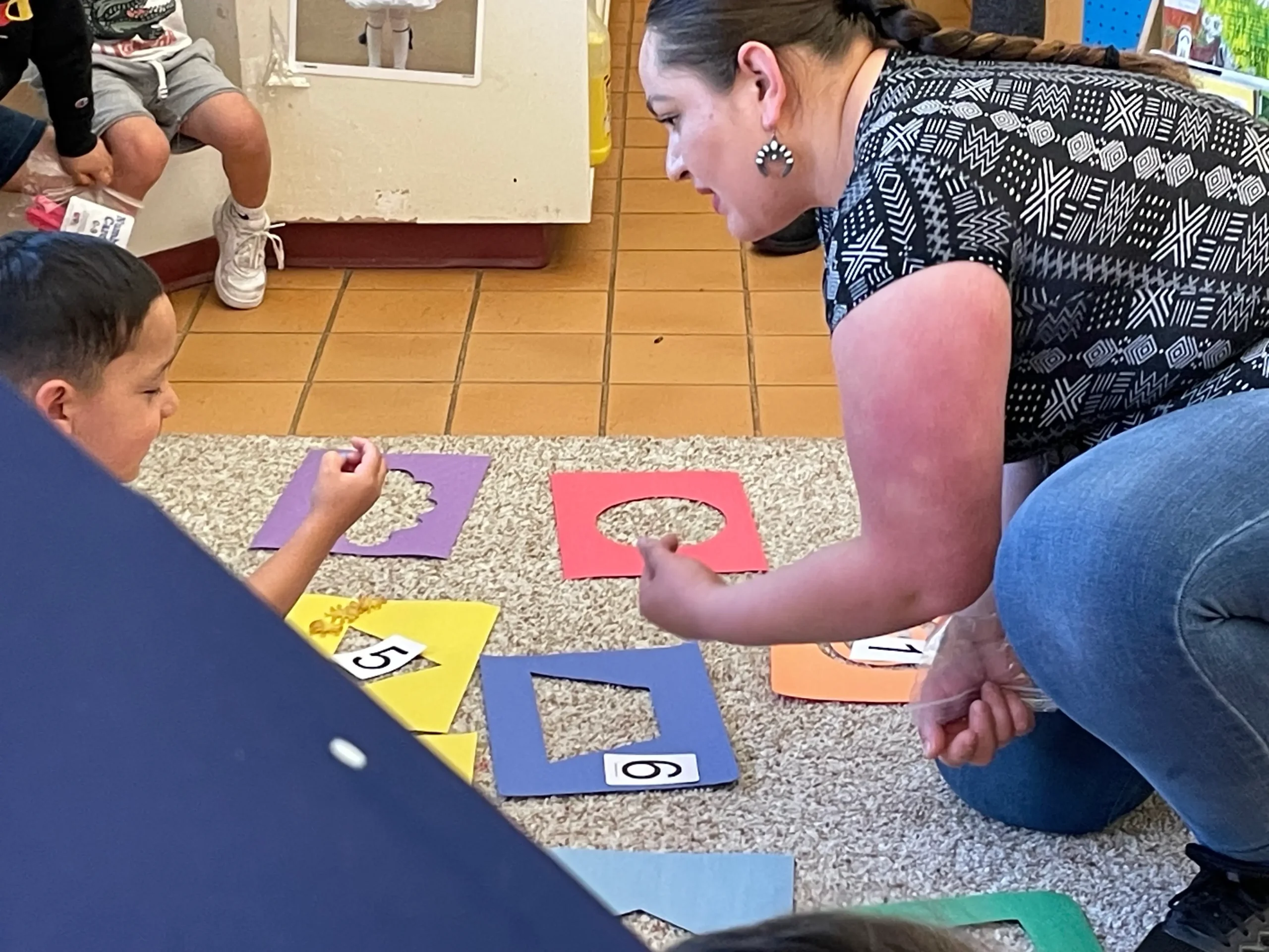 Shapes and Numbers Activity with Young Children Courtesy photo: Shapes and numbers activity with young children.