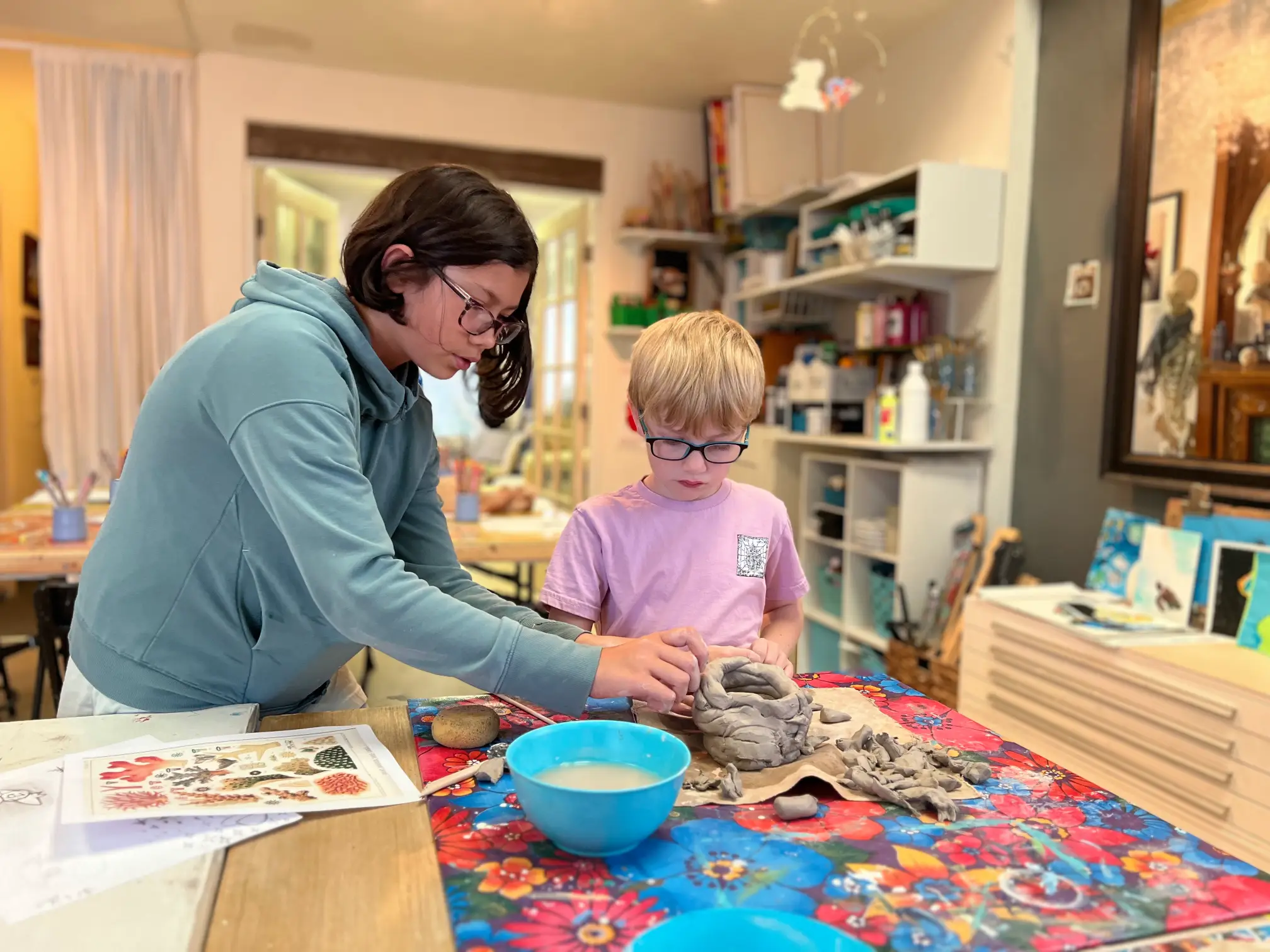 teacher helping student