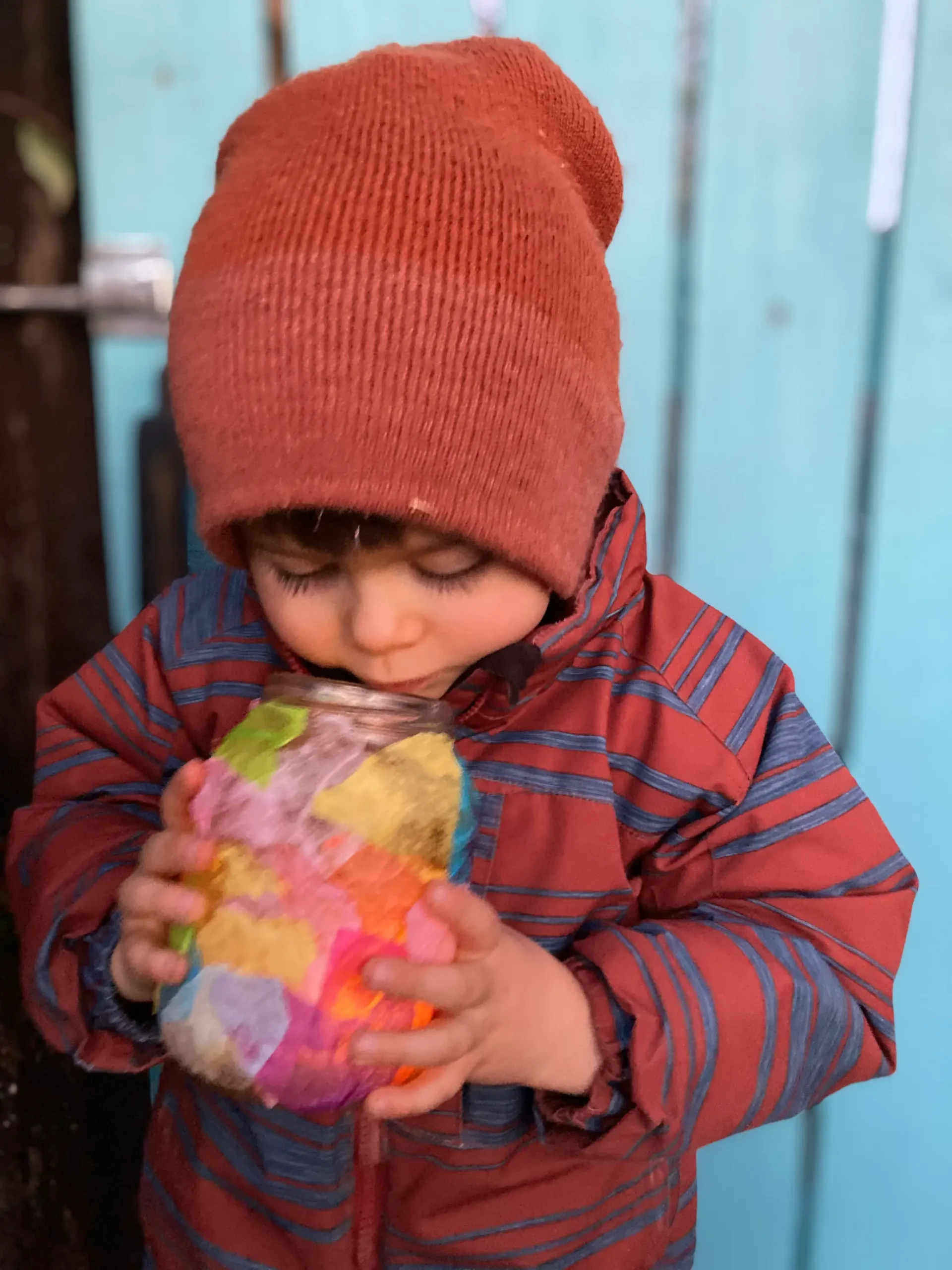 Courtesy photo: Aurora’s child looking at their solstice lantern.